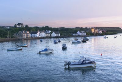 view from the Newport boat club at sunset on a summers evening at high tide