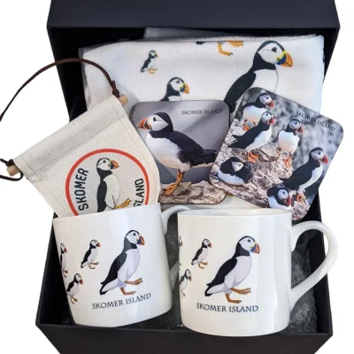 puffin gift box with china puffin mugs, coasters and a tea towel and hanging penant